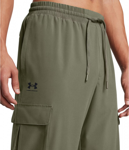 БРЮКИ UA VIBE WOVEN CARGO PANTS ЗЕЛЕНЫЙ БРЮКИ UA VIBE WOVEN CARGO PANTS ЗЕЛЕНЫЙ