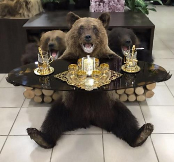 Чучело Медвежонок сидячий со столом